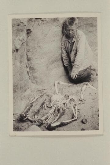 Bruce Wilson posed with the skeleton