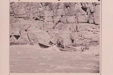 18 foot aluminum hull with two 35HP outboards in one of Grand Canyon's rapids