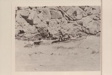 Marston drives the "Esmeralda II" into 217 Mile Rapid