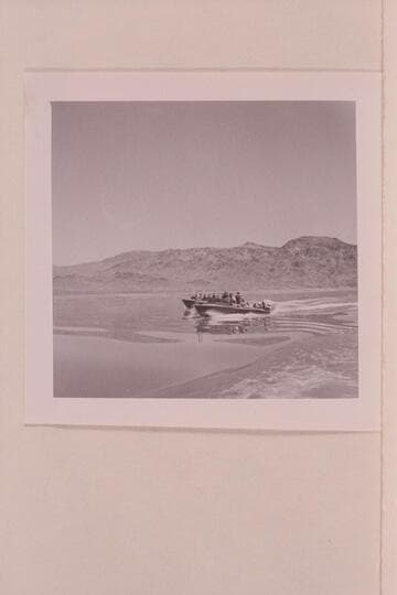 The three boats cruising on Lake Mead