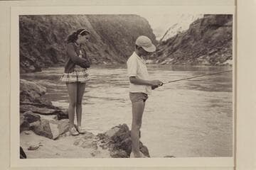 Debbie Marston watches Jeff Marston at fishing.  Separation Canyon