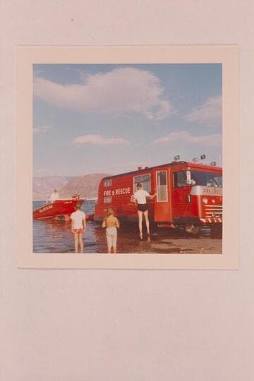 Bill Austin in the boat directing the launching of the jet fire boat.  Boat landing at Boulder City