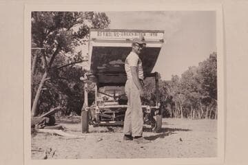 Lug Larsen preparing to unload the "Galloway" at Carrs Landing.  Browns Hole