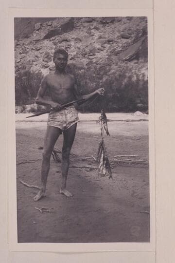 Frank Shoemaker with a string of channel catfish