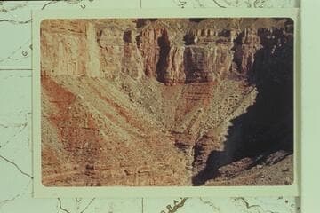 Steep talus at head of bay between Great Thumb Point and Tahuta Point, in the most southerly part of the bay. This rough ground bars the horses from progress up the Grand Canyon and the burro from going down